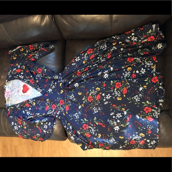 2/$10 Brand new with tags wrap dress. - Picture 2 of 3